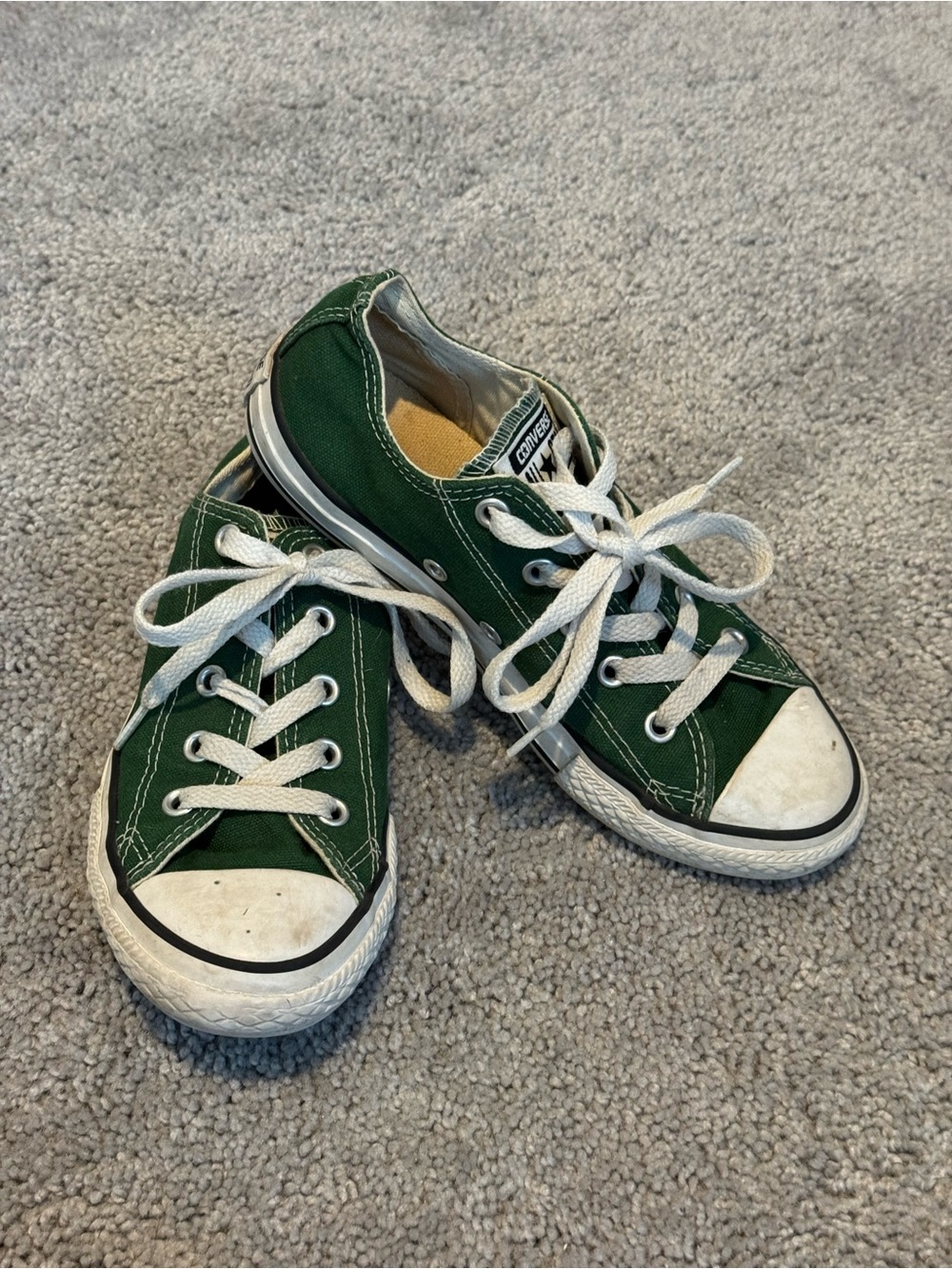 green canvas Converse Chuck Taylor All Star low top sneakers